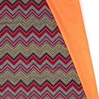 Tissu Softshell Chevrons envers polaire orange fluo sur fond Vert - Par 10 cm