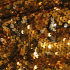 Tissu Sequins réversible argent sur fond Or - Par 10 cm