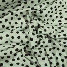 Tissu Jersey Coton Bio Pois déstructurés noirs sur fond Vert menthe - Par 10 cm