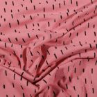 Tissu Jersey Coton Bio Pointillés noirs sur fond Rose - Par 10 cm
