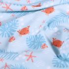 Tissu Lycra maillot de bain Crabes et étoiles de mer sur fond Bleu - Par 10 cm