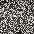 Tissu Coton satiné extensible Tâches léopard blanches sur fond Noir - Par 10 cm