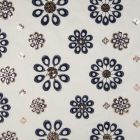 Tissu Voile de coton Fleurs bleues brodées de sequins argentés sur fond Blanc - Par 10 cm