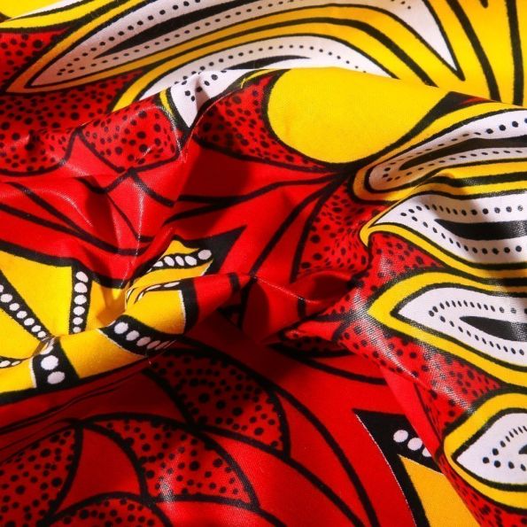 Tissu Wax africain N°605 Cercles abstrait sur fond Rouge - Par 10 cm