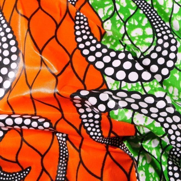 Tissu Wax africain N° 617 Serpentins sur fond Orange - Par 10 cm