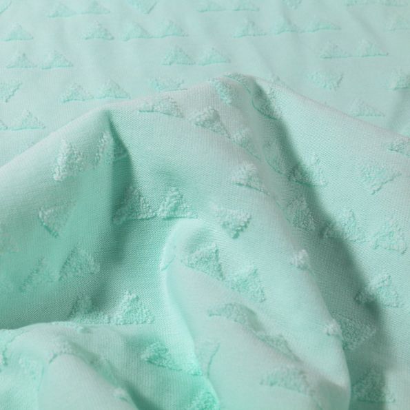 Tissu Jersey Coton Triangles en relief sur fond Vert menthe - Par 10 cm